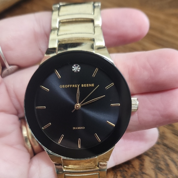 Geoffrey Beene Other - Geoffrey Beene Black Dial Gold Band Watch
